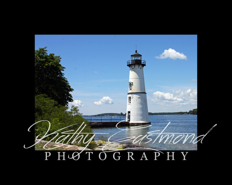"Rock Island Lighthouse" 5x7 print mounted on a black 8x10 acid-free matte for $25 with free shipping within the U.S.  (Kathy Eastmond's signature will replace the copyright  logo )