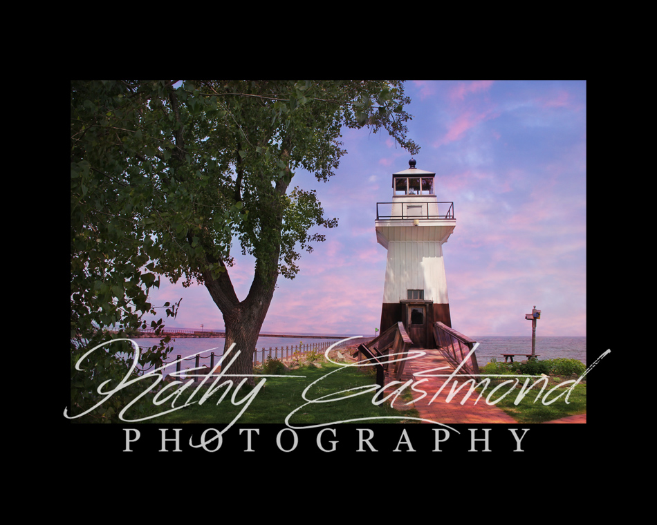 "Sunset Lighthouse" 5x7 print mounted on a black 8x10 acid-free matte for $25 with free shipping within the U.S.  (Kathy Eastmond's signature will replace the copyright logo)